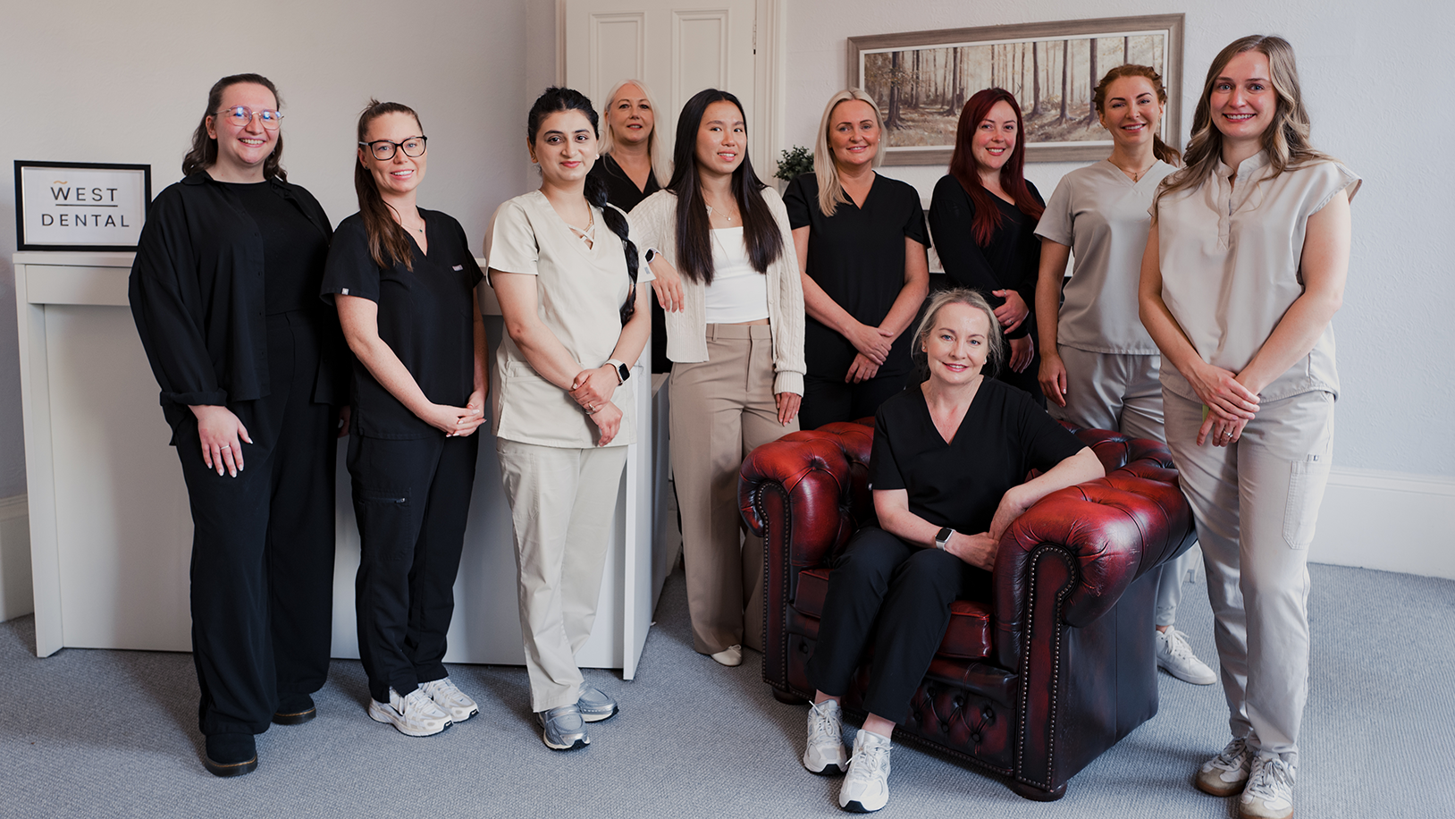 The friendly and professional West Dental team posing in their Glasgow practice